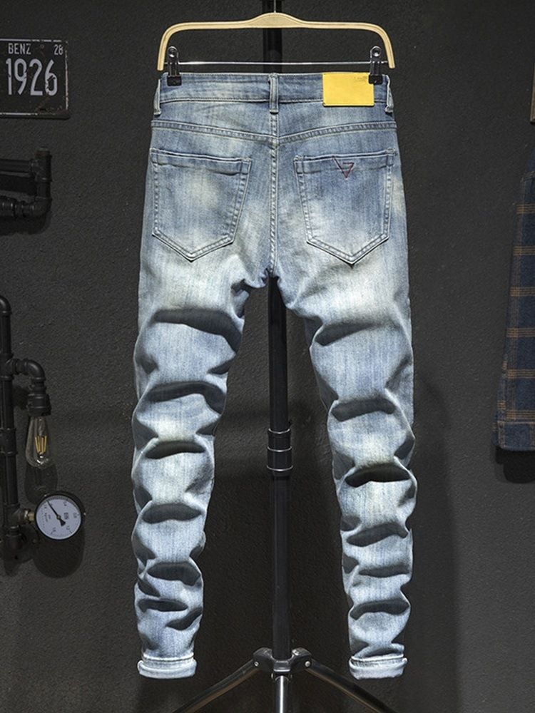 Enkelt Hål Med Mitten Av Midjan Modejeans