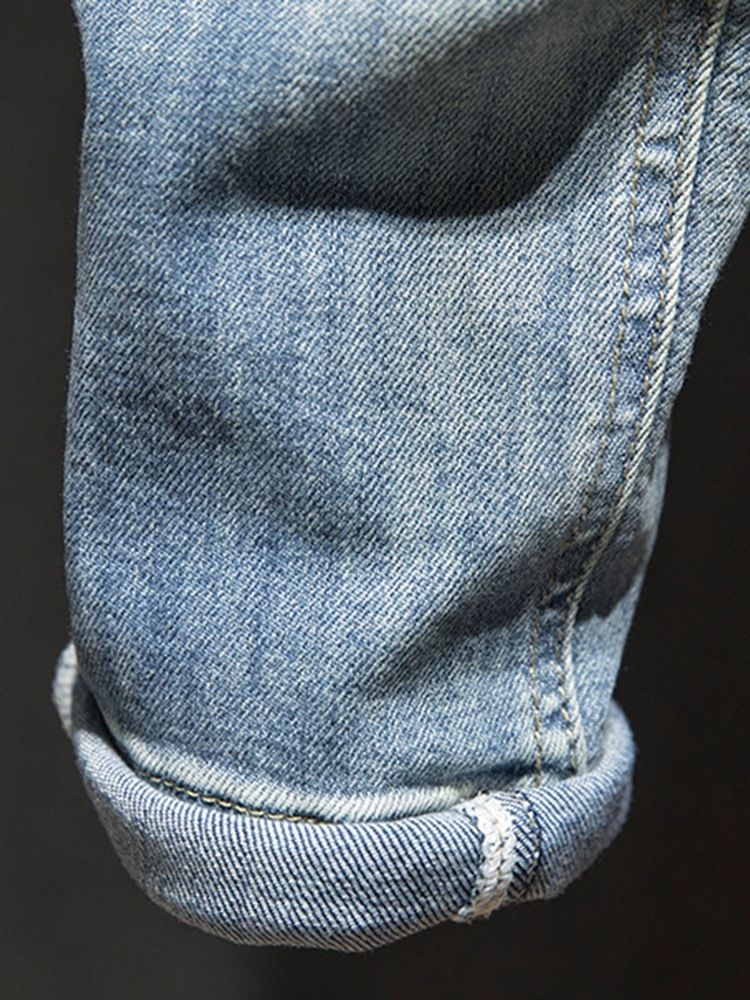 Enkelt Hål Med Mitten Av Midjan Modejeans