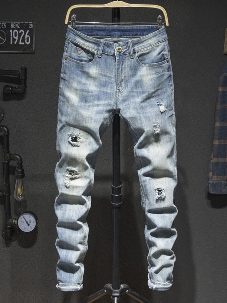 Enkelt Hål Med Mitten Av Midjan Modejeans