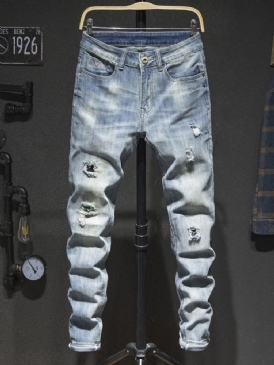 Enkelt Hål Med Mitten Av Midjan Modejeans