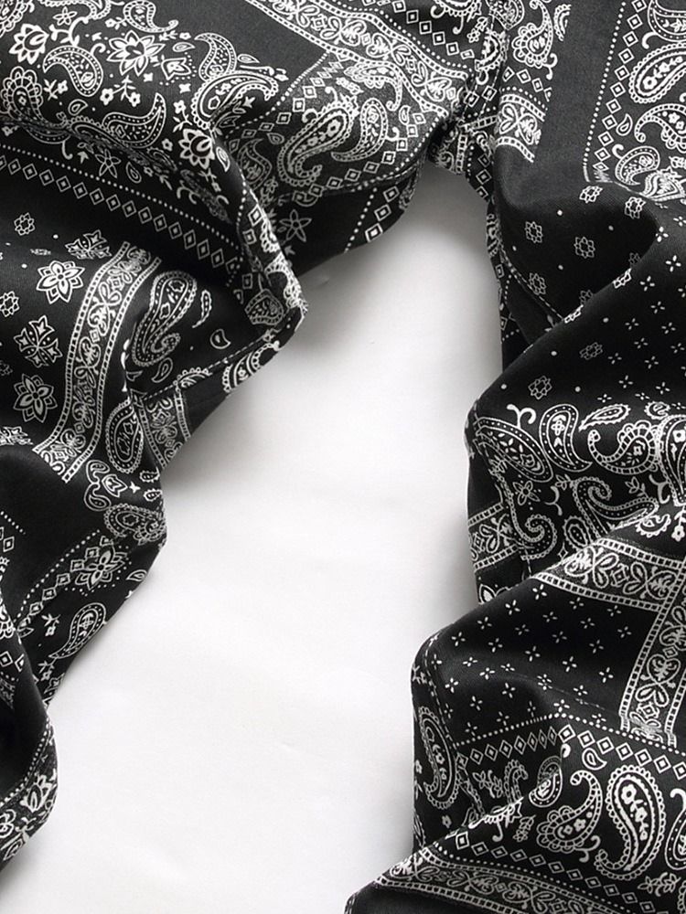 Raka Blommiga Jeans Med Mitten Av Midjan