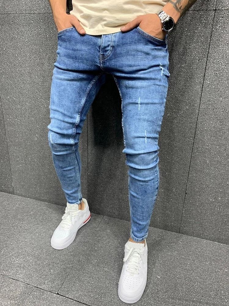 Vanliga Jeans Med Dragkedja I Mitten Av Midjan