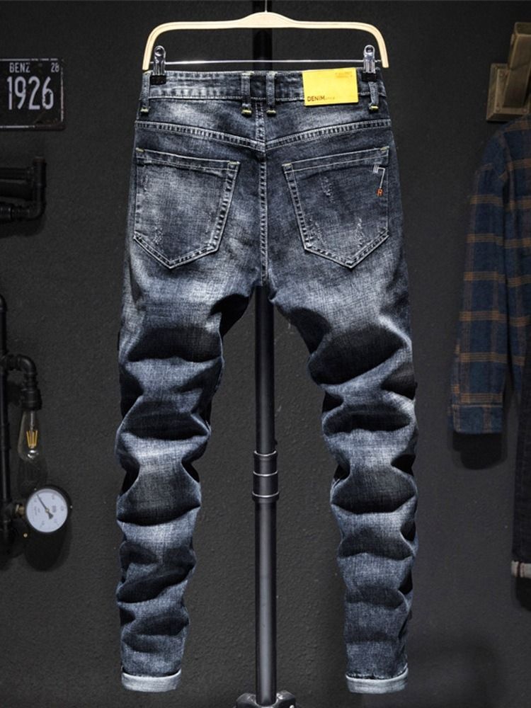 Vanligt Hål Mode Jeans Med Mid Midja