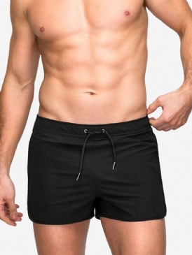 Slimma Enkla Snörningsbyxor Med Mitten Av Midjan. Casual Herrshorts